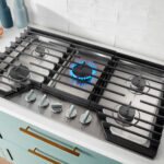 Whirlpool 36 Gas Cooktop with 5 Burners and EZ-2-Lift Hinged Cast-Iron Grates WCGK5036PS